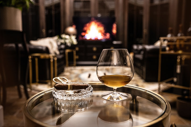 Hermitage Estate cozy cigar room and fireplaces call for a beverage and a snuggle.